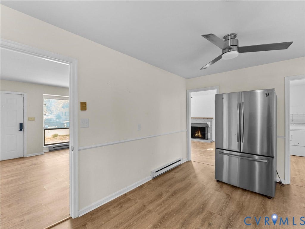 503 Briarwood Circle, Jefferson Circle, North Prince George, VA 23860 Wood-finish flooring, ceiling fan with integrated lighting, stainless steel French-door refrigerator, and chair rail molding