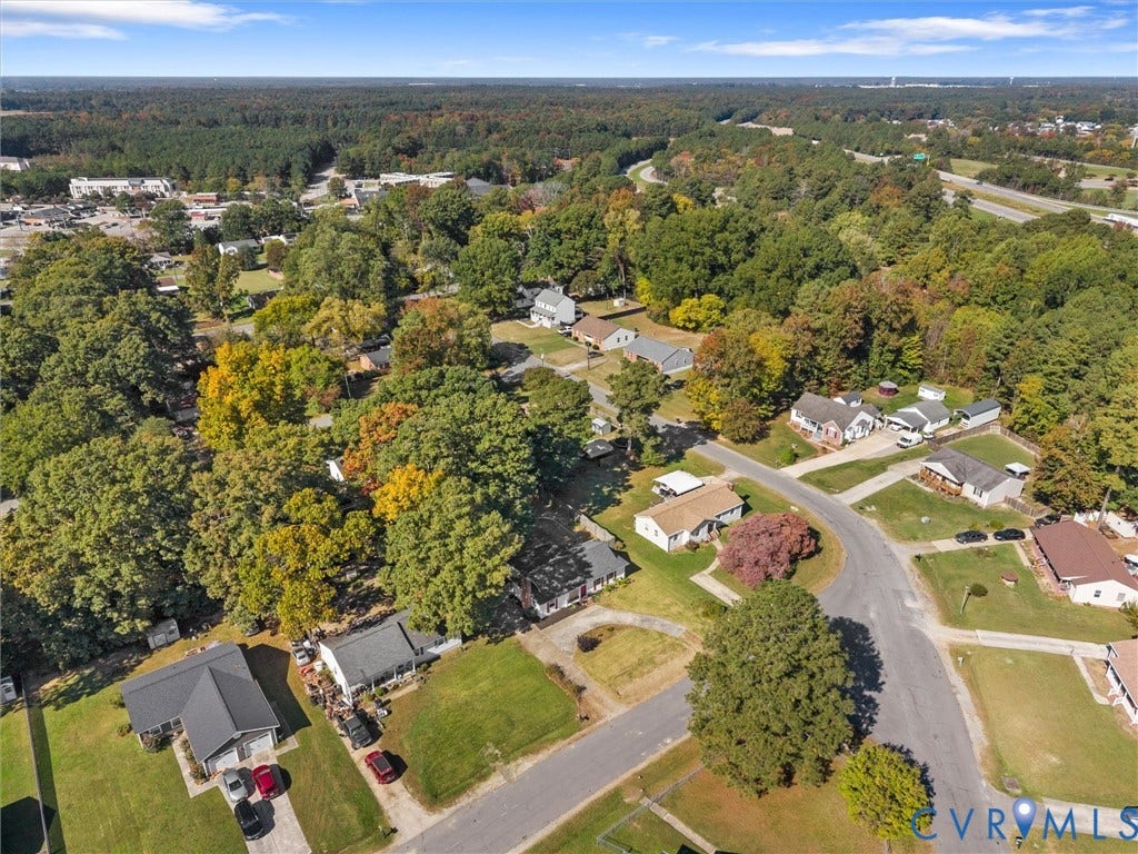 503 Briarwood Circle, Jefferson Circle, North Prince George, VA 23860 Aerial perspective of a residential neighborhood featuring established tree cover, paved roadways, and landscaped lots