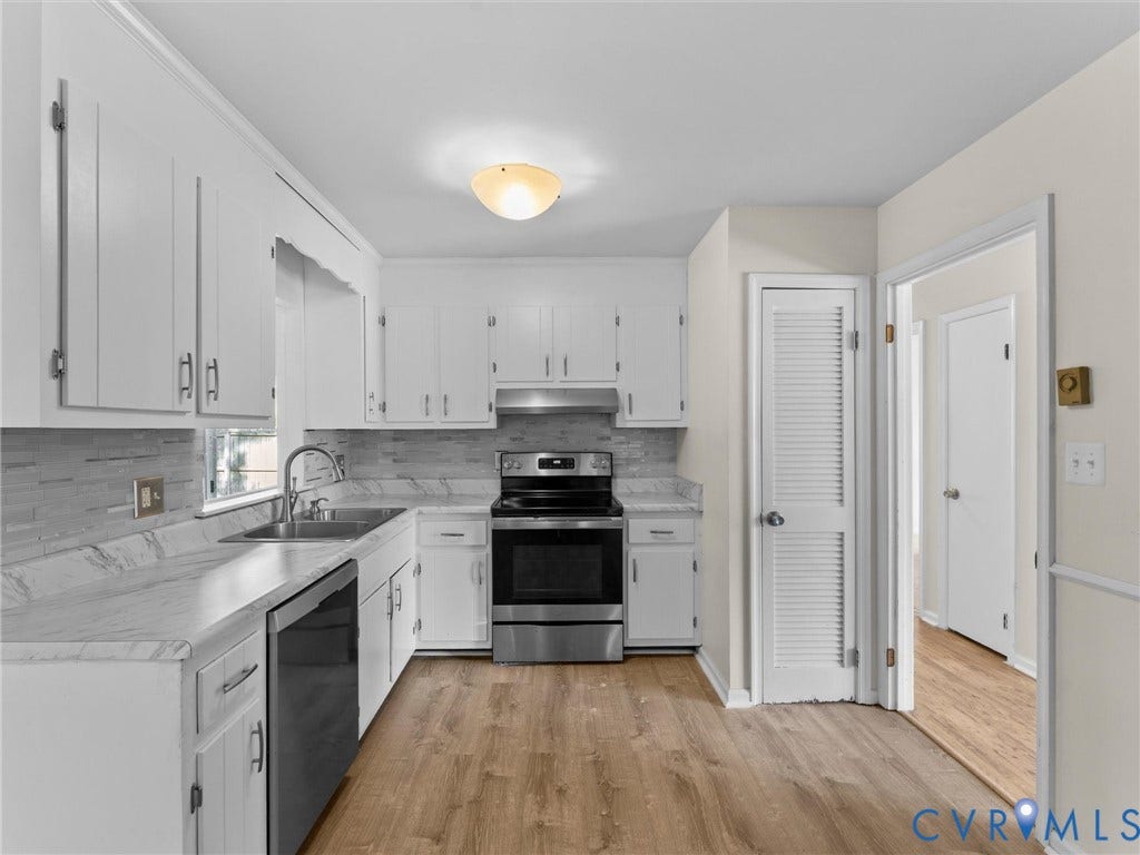 503 Briarwood Circle, Jefferson Circle, North Prince George, VA 23860 Kitchen featuring white cabinetry, stone-finish countertops, stainless steel appliances, a tile backsplash, and wood-finish flooring