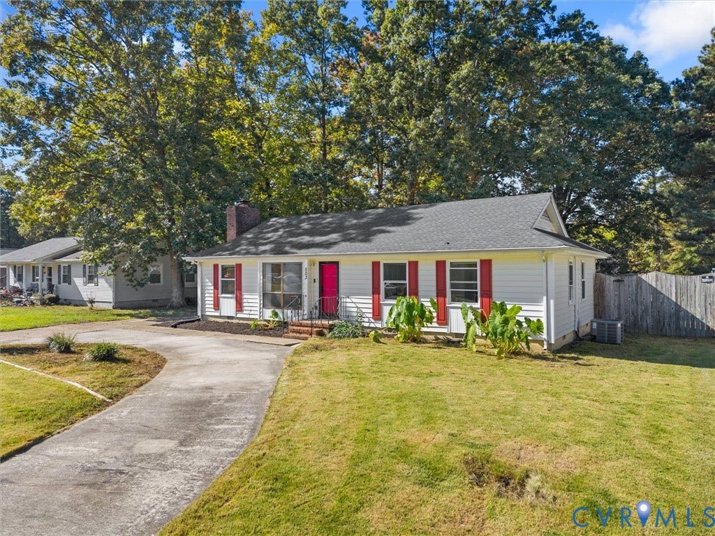 503 Briarwood Circle, Jefferson Circle, North Prince George, VA 23860 Single-story residence featuring white siding, red window shutters, an asphalt shingle roof, a brick chimney, and a concrete driveway