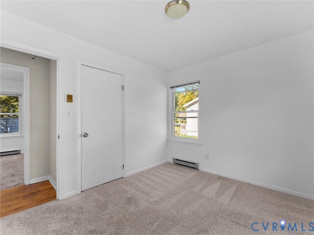 503 Briarwood Circle, Jefferson Circle, North Prince George, VA 23860 Room featuring wall-to-wall carpeting, a single-hung window, and a flush-mount ceiling light fixture