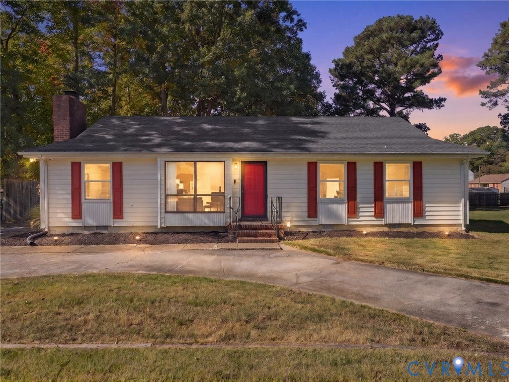 503 Briarwood Circle, Jefferson Circle, North Prince George, VA 23860 Single-story residence featuring horizontal siding, decorative exterior shutters, a brick chimney, and a concrete driveway