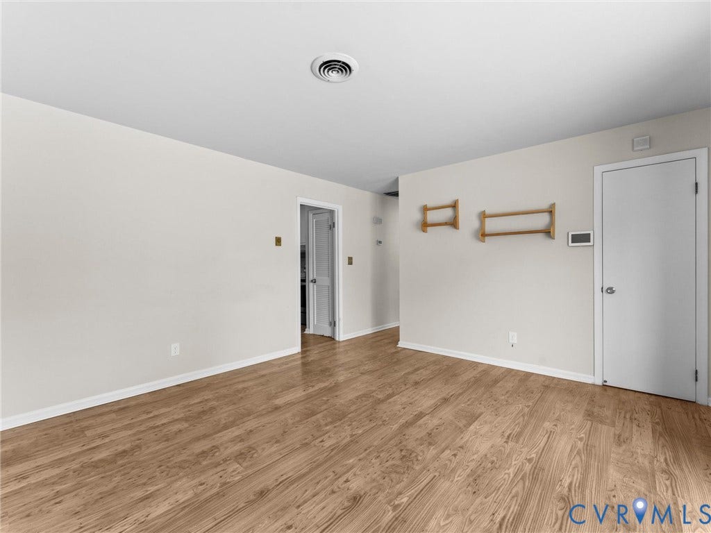 503 Briarwood Circle, Jefferson Circle, North Prince George, VA 23860 Neutral interior walls, wood-finish flooring, and solid-core interior doors
