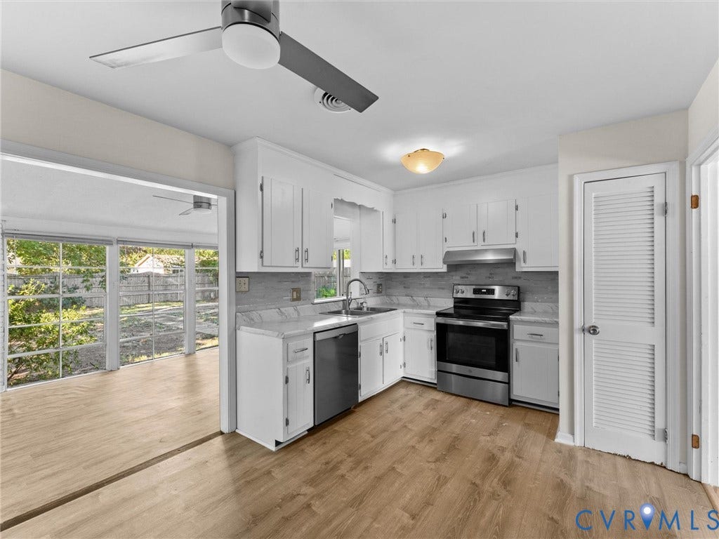 503 Briarwood Circle, Jefferson Circle, North Prince George, VA 23860 Kitchen featuring white shaker-style cabinetry, stone-finish countertops, stainless steel appliances, wood-finish flooring, and a louvered pantry door