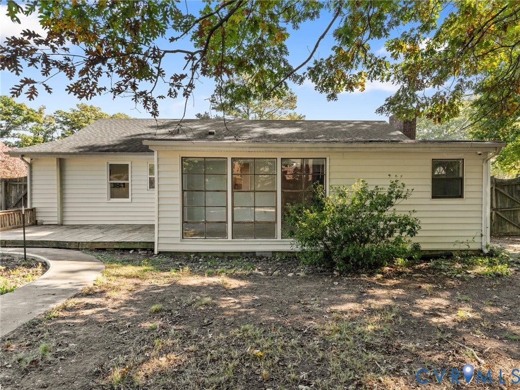 503 Briarwood Circle, Jefferson Circle, North Prince George, VA 23860 Rear exterior featuring horizontal lap siding, large paneled windows, a concrete walkway, and a wooden deck
