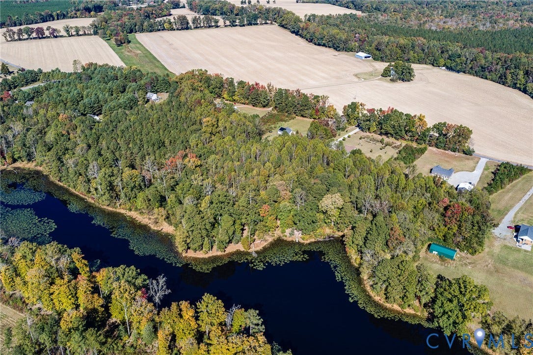 3820 Upshaw Road, Decker's Pond, Aylett, VA 23009 Aerial view featuring expansive acreage, mature forest coverage, and direct waterfront access