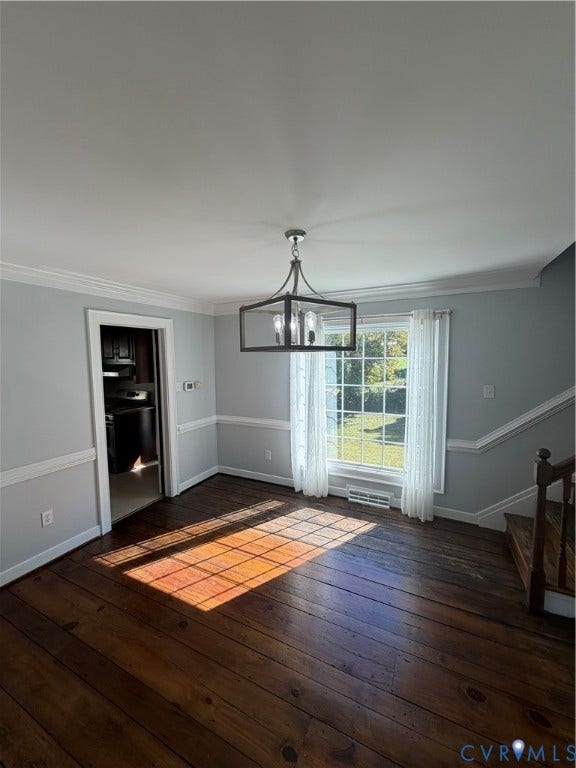 2305 Lydell Drive, Ginter Park - Adjacent, Glen Allen, VA 23228 Dining area featuring wood-finish flooring, crown molding, chair rail trim, and a metal-frame geometric chandelier