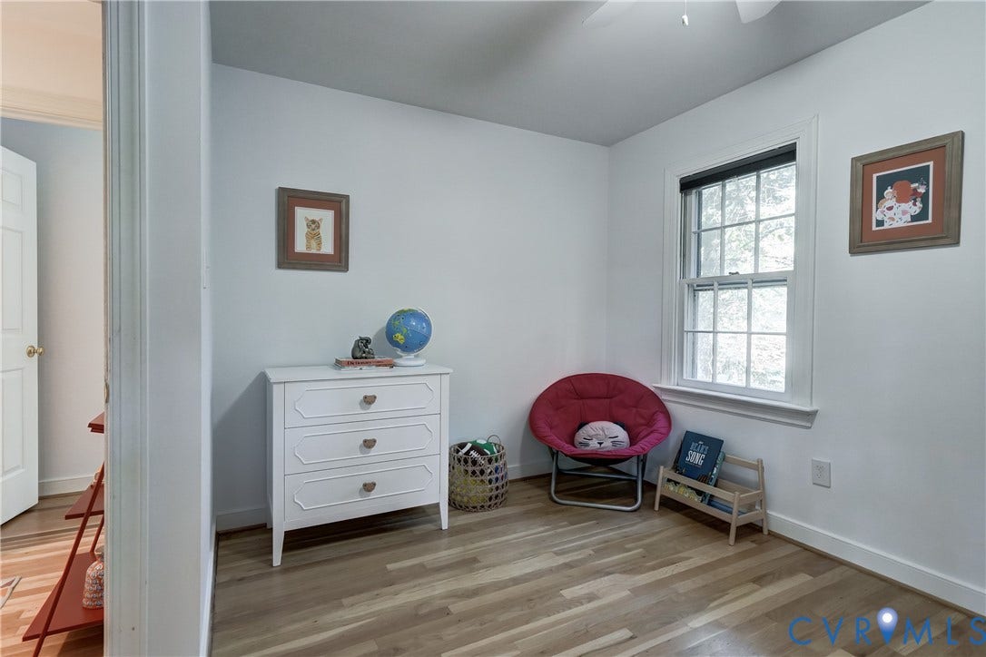 5 Bridgehampton Place, Yorkshire, Henrico, VA 23229 Room featuring wood-finish flooring, a double-hung window, and a ceiling fan