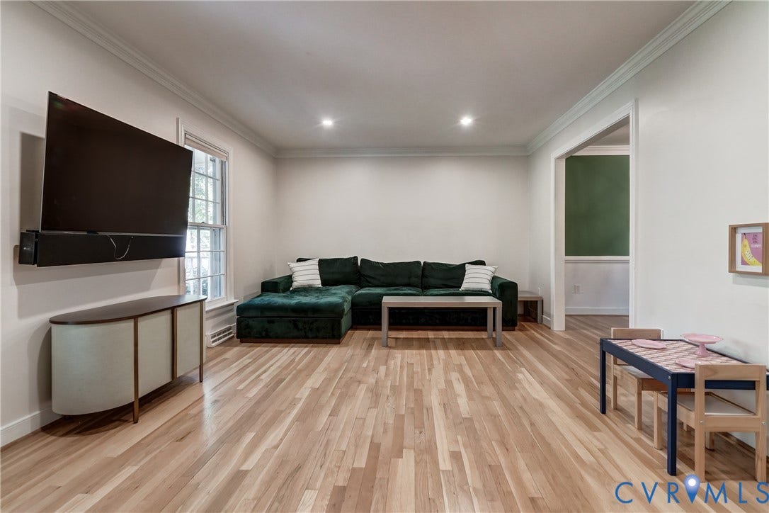 5 Bridgehampton Place, Yorkshire, Henrico, VA 23229 Living area featuring light wood-finish flooring, recessed lighting, crown molding, and a multi-pane window