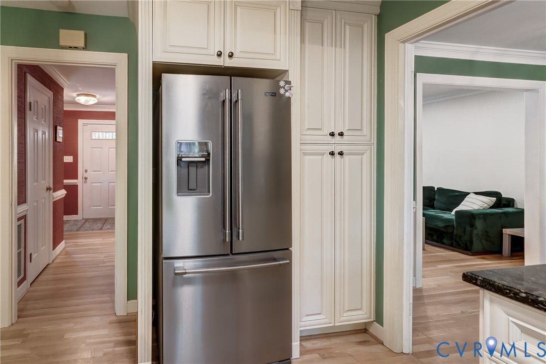 5 Bridgehampton Place, Yorkshire, Henrico, VA 23229 Built-in floor-to-ceiling cabinetry, stainless steel French-door refrigerator, and wood-finish flooring