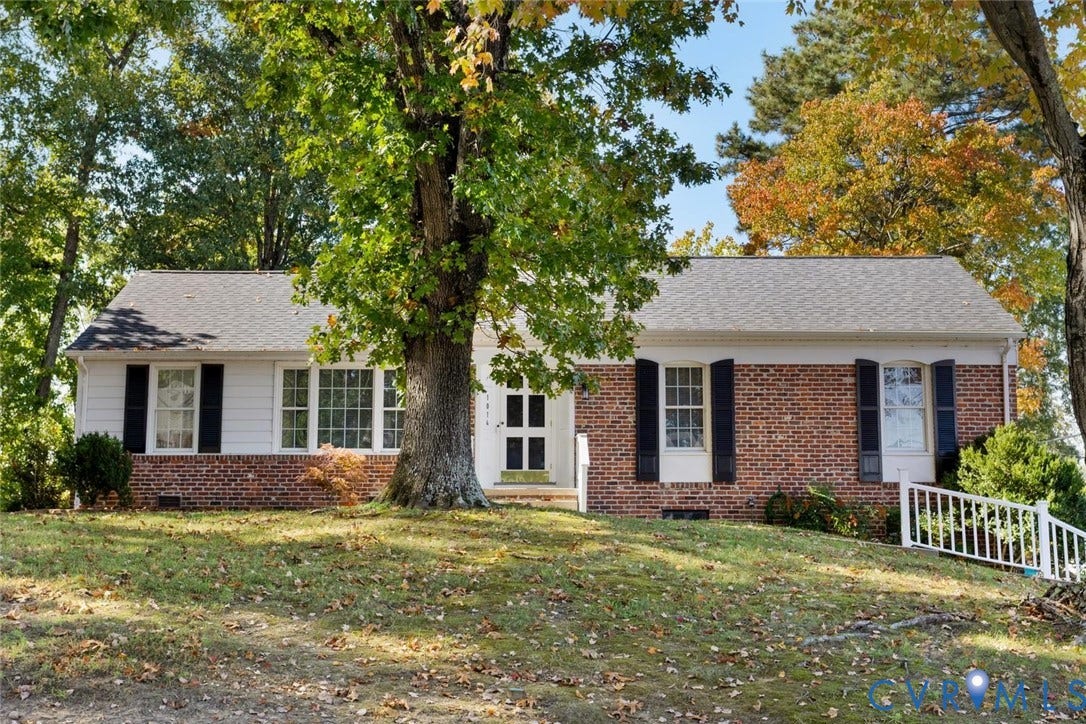 1014 Westbriar Drive, Henrico, VA 23238 Single-story exterior featuring a brick and siding facade, contrasting window shutters, a shingled roof, and mature landscaping