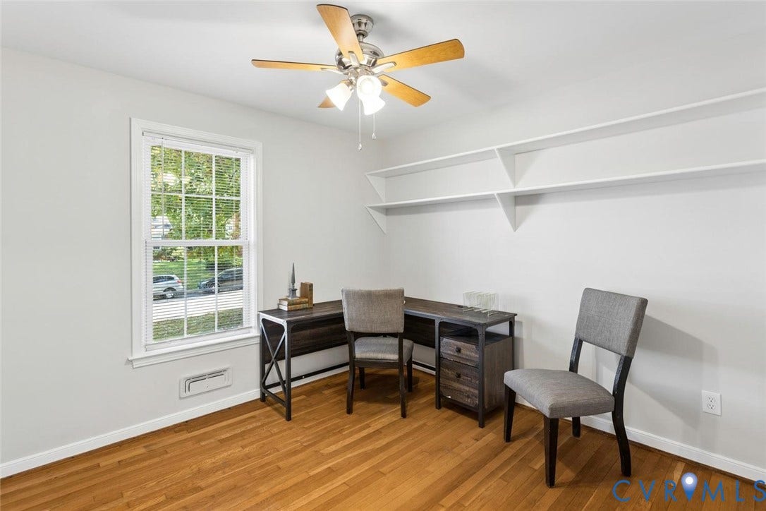 1014 Westbriar Drive, Henrico, VA 23238 Room with wood-finish flooring, white wall-mounted shelving, a multi-pane window, and a ceiling fan with integrated lighting