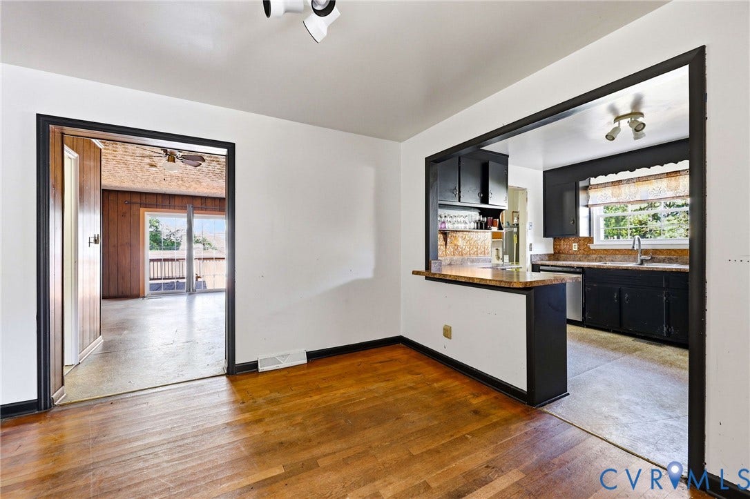 628 Ryan Avenue, Ryan, Colonial Heights, VA 23834 Hardwood flooring, kitchen pass-through window with a laminate countertop, black cabinetry, stainless steel dishwasher, and recessed ceiling lighting