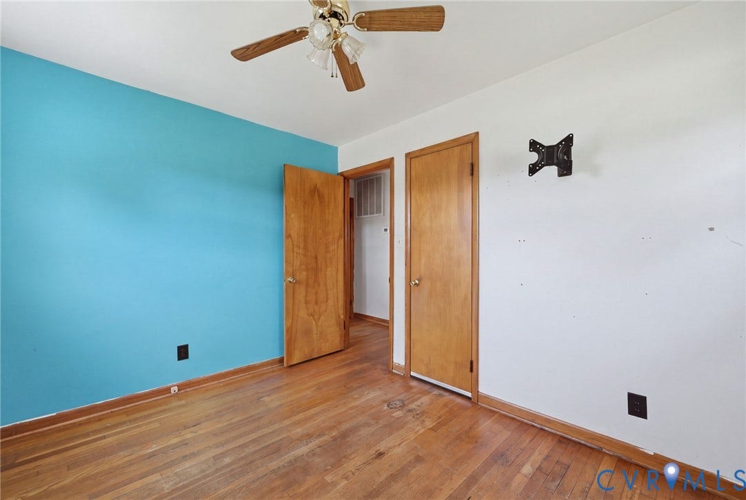 628 Ryan Avenue, Ryan, Colonial Heights, VA 23834 Room featuring wood-finish flooring, a ceiling fan with integrated lighting, and solid-core wood-finish doors