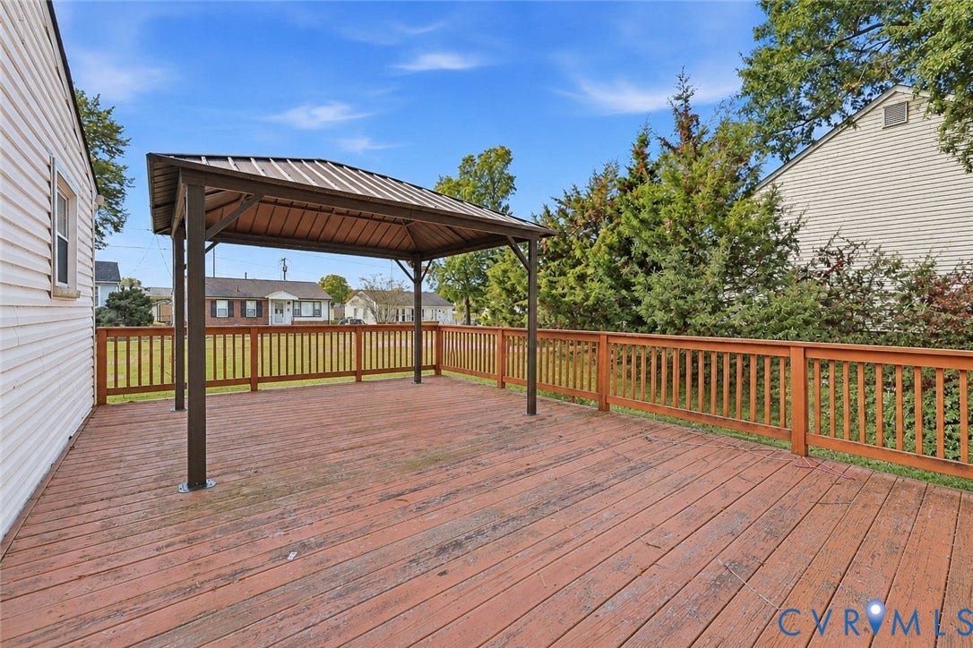 628 Ryan Avenue, Ryan, Colonial Heights, VA 23834 Wood-plank deck featuring a covered metal-roof gazebo and perimeter wooden railings