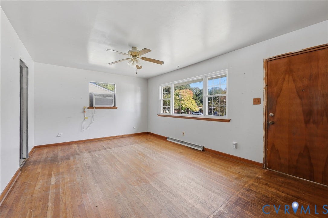 628 Ryan Avenue, Ryan, Colonial Heights, VA 23834 Interior space featuring wood-finish flooring, a multi-pane window, and a central ceiling fan