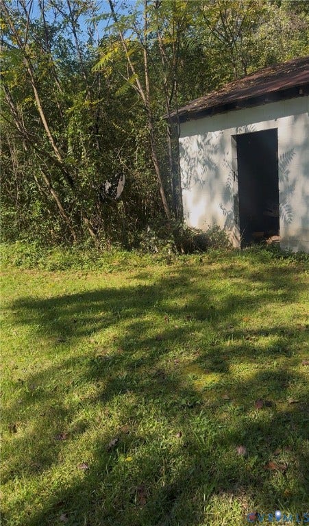 20367 Monrovia Road, Orange County, Orange, VA 22960 Outdoor structure featuring light-colored exterior walls and a pitched roof, situated on a grassy lot with mature trees