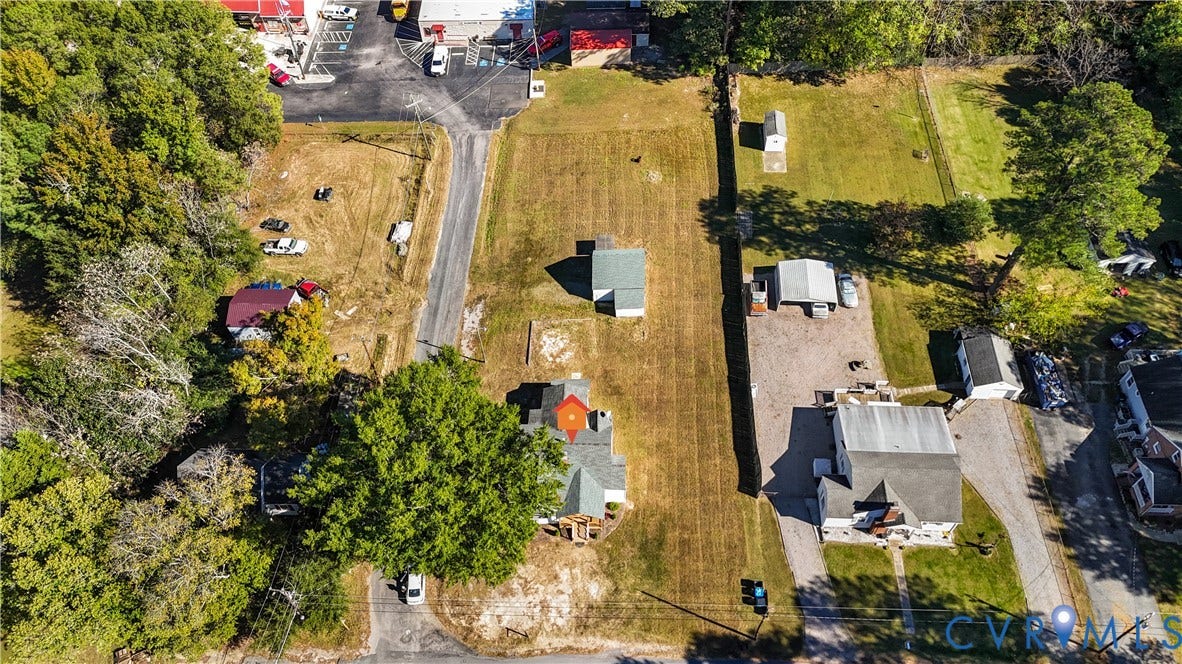4003 Lee Boulevard, Dinwiddie, VA 23803 Aerial view of property featuring an expansive lot, mature trees, and existing structural footprint