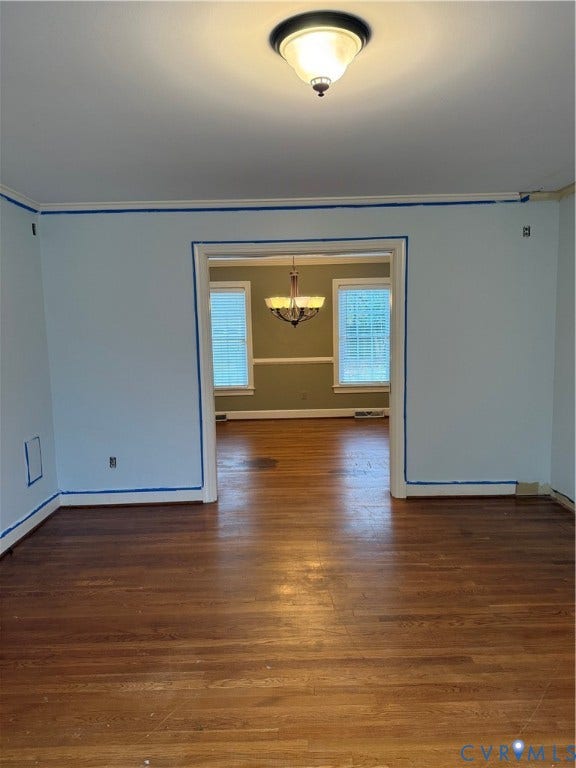 20 Jonquil Lane, Newport News, VA 23606 Hardwood flooring, multi-light chandelier, chair rail molding, and flush-mount ceiling lighting