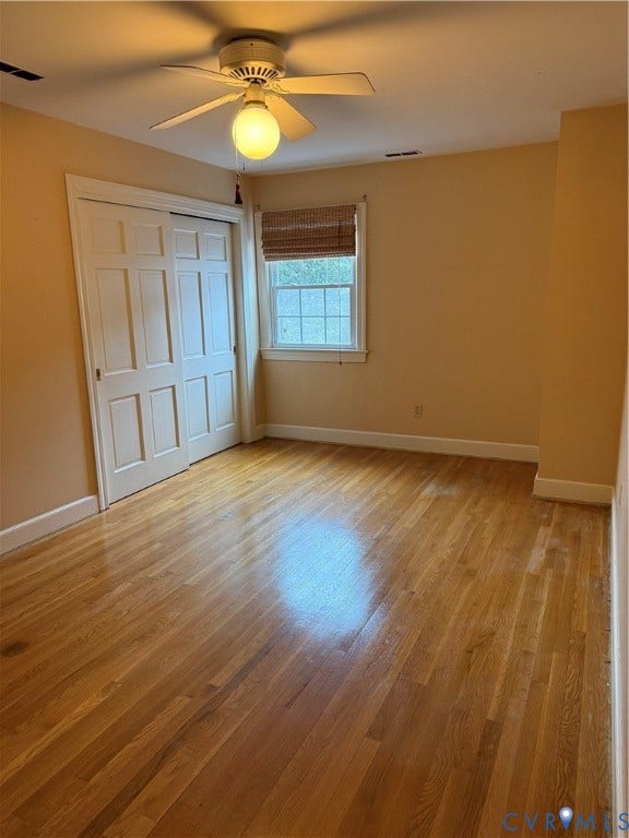 20 Jonquil Lane, Newport News, VA 23606 Polished wood-finish flooring, multi-pane window, ceiling fan with integrated light, and paneled closet doors