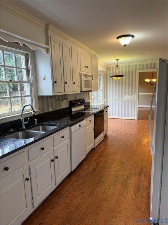 20 Jonquil Lane, Newport News, VA 23606 Kitchen featuring white shaker-style cabinetry, dark stone countertops, wood-finish flooring, and built-in appliances