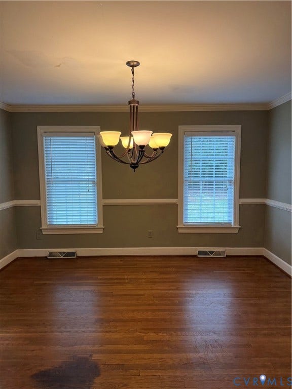 20 Jonquil Lane, Newport News, VA 23606 Room featuring wood-finish flooring, chair rail molding, crown molding, and a multi-arm chandelier with frosted glass shades