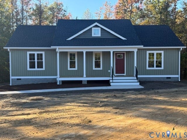 745 Gully Tavern Road, Detached, Rice, VA 23966 Single-story exterior featuring vertical siding, a covered front porch with column supports, a prominent front-facing gable, and a concrete walkway