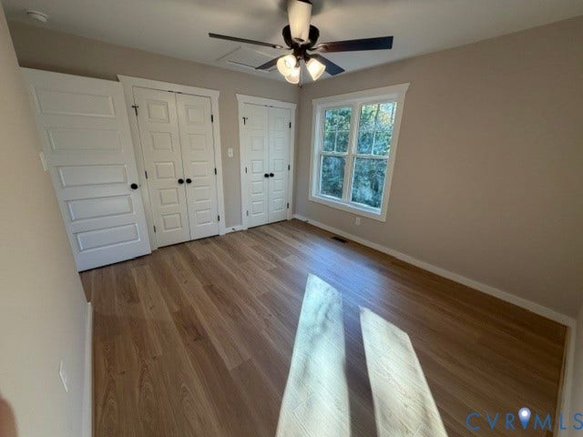 745 Gully Tavern Road, Detached, Rice, VA 23966 Wood-finish flooring, multi-panel doors, double-closet configuration, and a central ceiling fan with integrated lighting