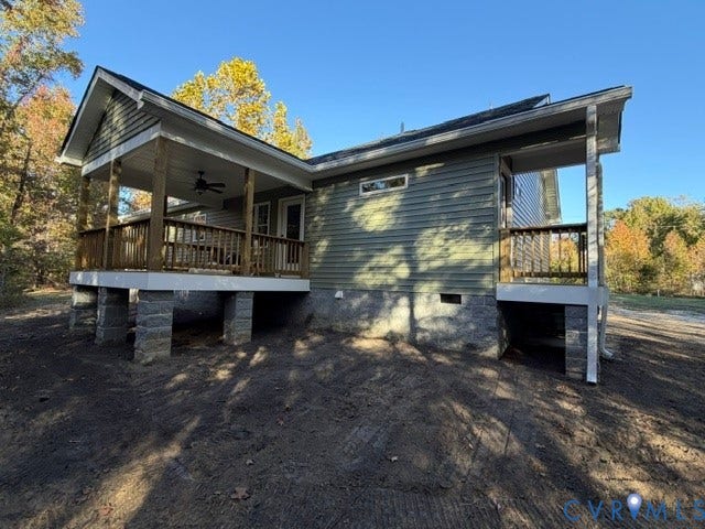745 Gully Tavern Road, Detached, Rice, VA 23966 Exterior featuring horizontal siding, a raised deck with wooden railing, a covered porch with a ceiling fan, and a concrete block foundation