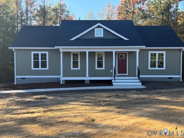 745 Gully Tavern Road, Detached, Rice, VA 23966 Board-and-batten siding exterior featuring a covered front porch with square columns, a gable roofline, and a concrete walkway