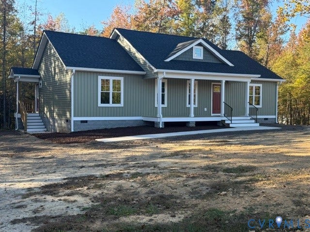 745 Gully Tavern Road, Detached, Rice, VA 23966 Exterior featuring vertical siding, a covered front porch with columns, a gable roofline, and masonry foundation skirting