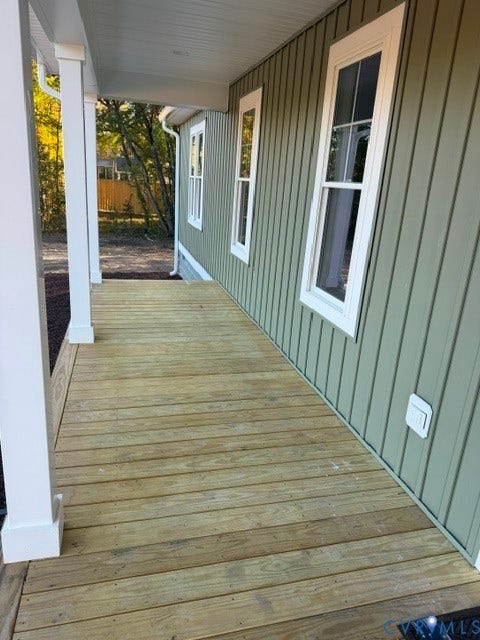 745 Gully Tavern Road, Detached, Rice, VA 23966 Covered porch with wood decking, vertical board siding, and square structural support columns