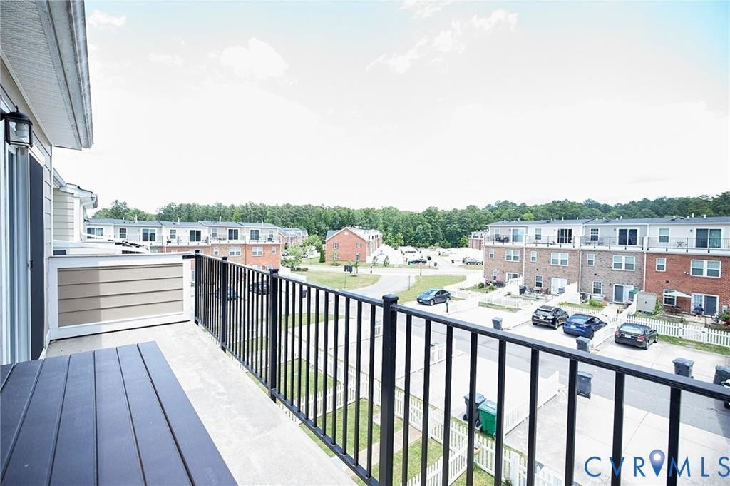 11316 Duncan park Court, Glen Allen, VA 23060 Elevated balcony featuring a black metal railing and concrete flooring