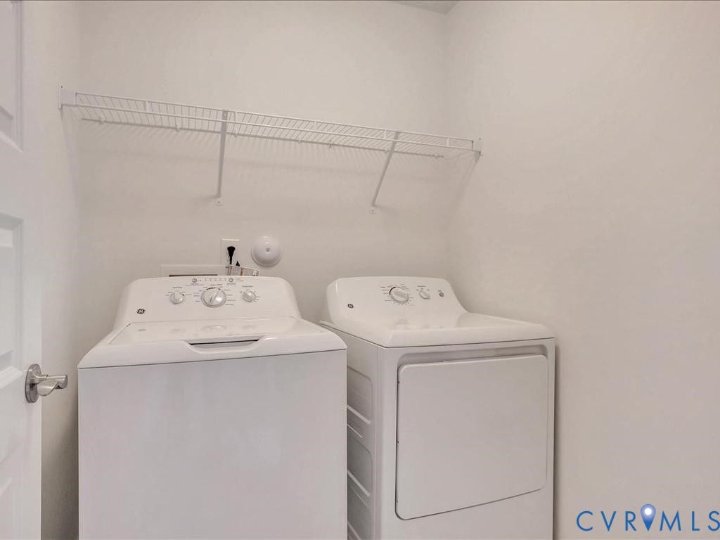 338 Hay Mill Alley, Glen Allen, VA 23060 Laundry area featuring a wall-mounted wire storage shelf and dedicated appliance hookups