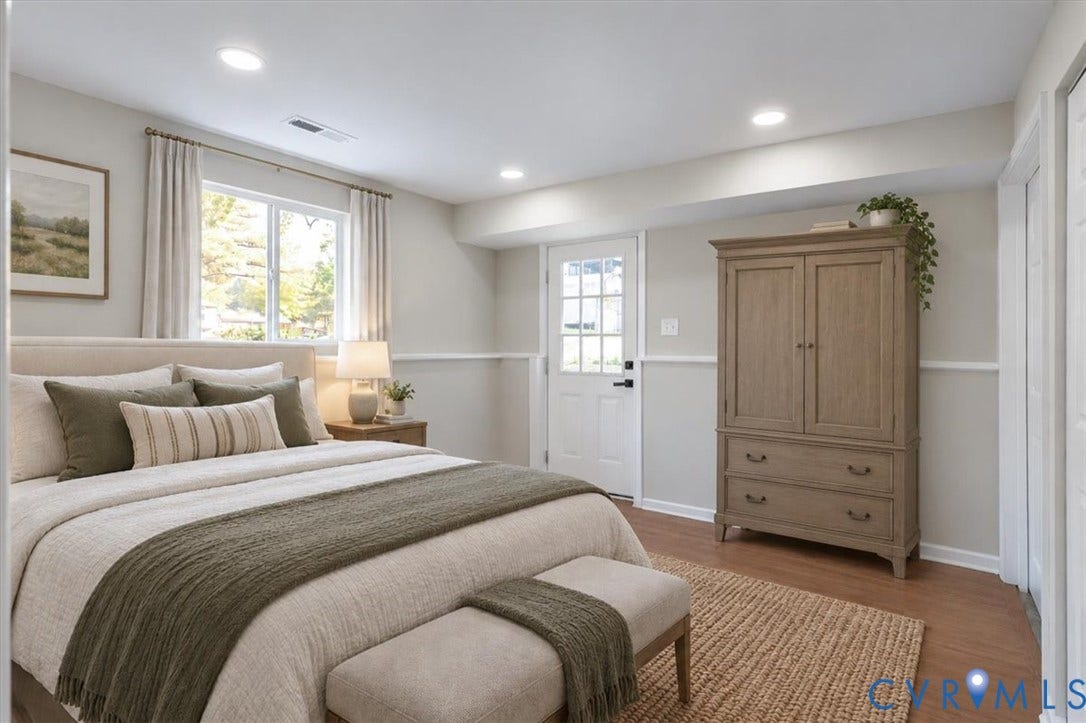 9201 Packard Court, Glen Allen, VA 23060 Neutral-toned interior featuring wood-finish flooring, recessed lighting, chair rail molding, and a full-light exterior door