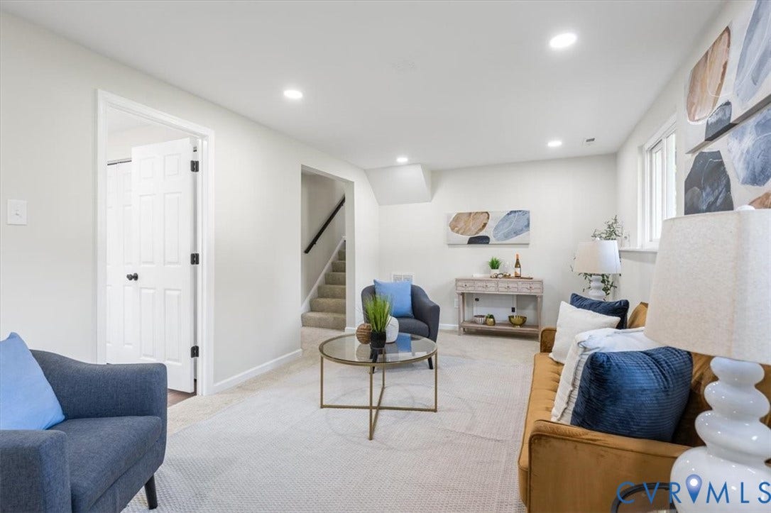 9201 Packard Court, Glen Allen, VA 23060 Neutral-toned interior space featuring recessed ceiling lighting, wall-to-wall carpeting, and a multi-panel door