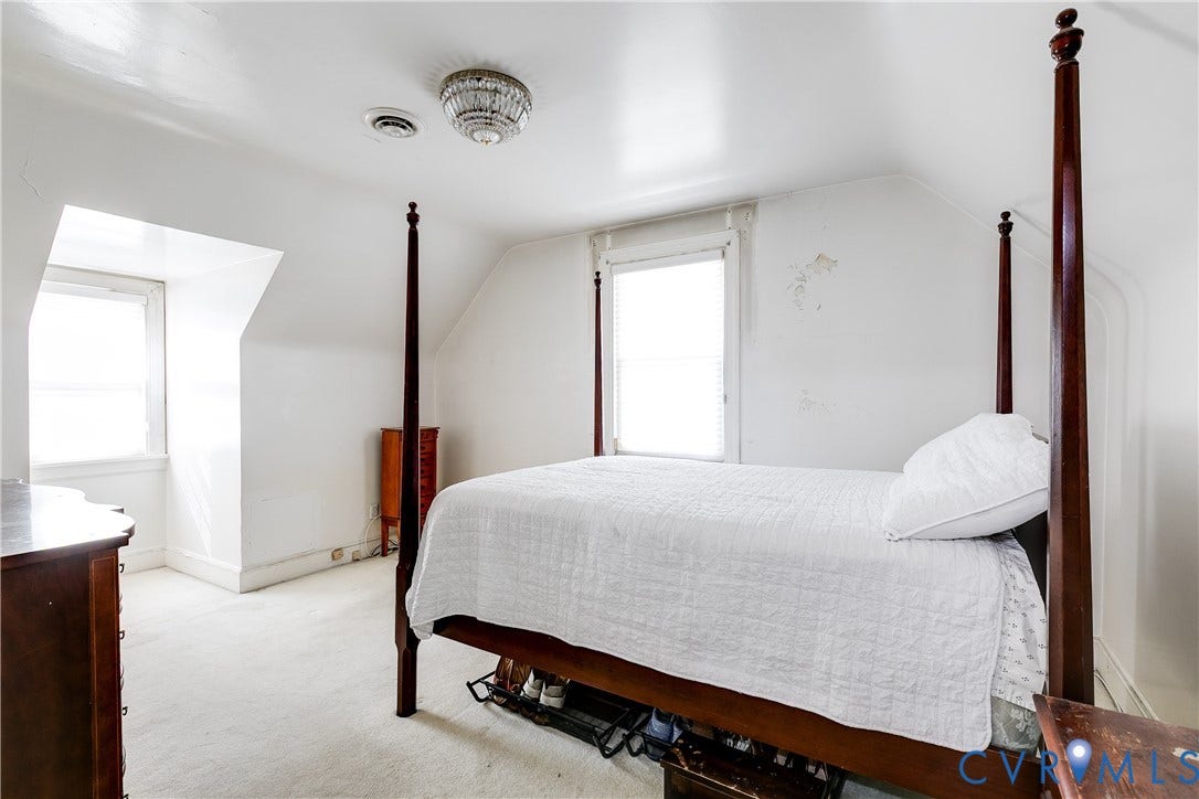 1406 Wentbridge Road, Richmond, VA 23227 Vaulted ceilings featuring two dormer windows and a decorative flush-mount ceiling fixture