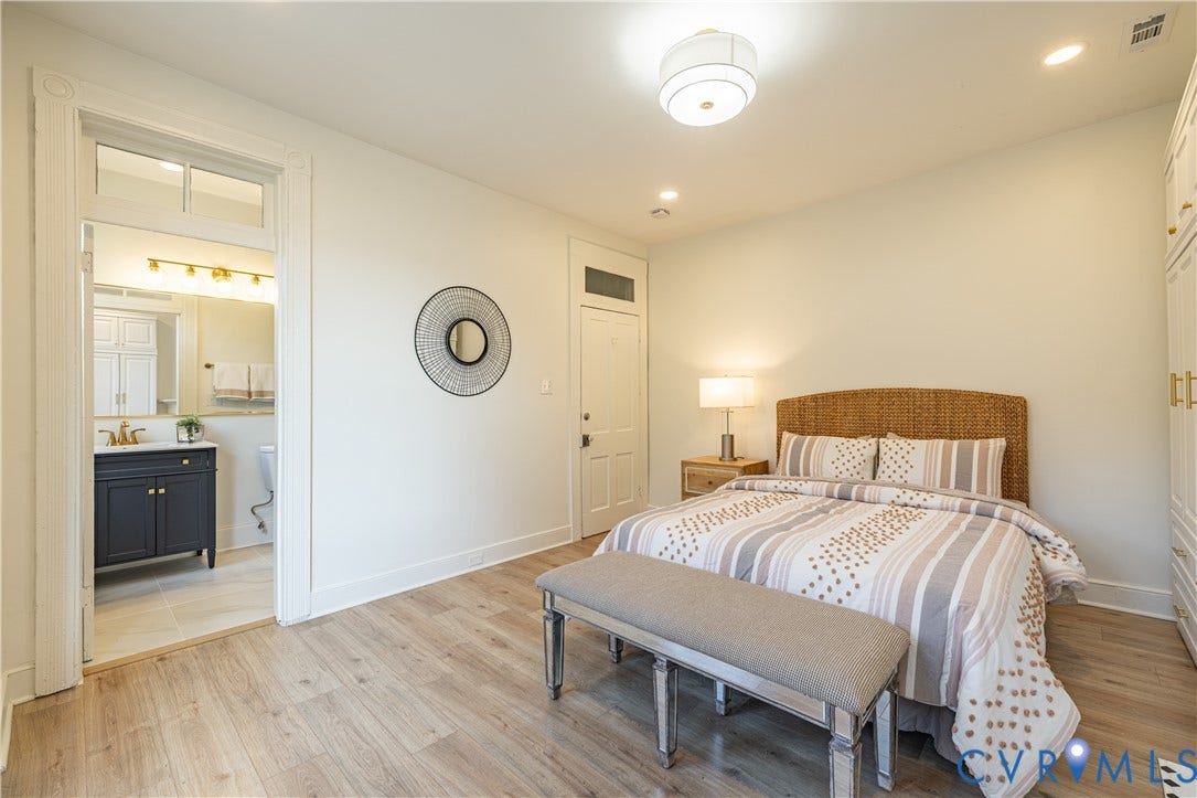 1108 W Marshall Street, Richmond, VA 23220 Wood-finish flooring, high ceilings with recessed lighting, integrated transom windows above entry doors, and built-in cabinetry