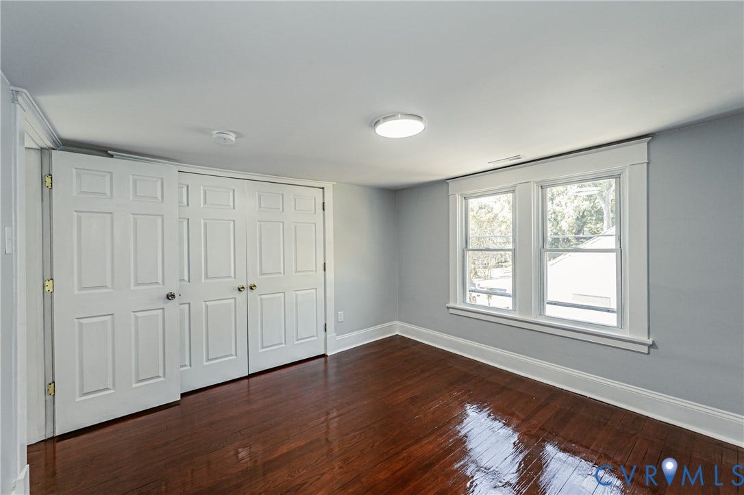 710 La Von Drive, Henrico, VA 23227 Refinished hardwood flooring, dual-panel interior doors, and double-hung windows with white casing