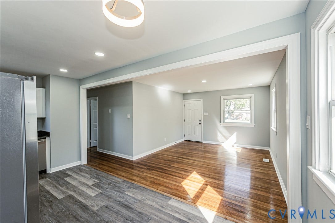 506 Meadowspring Road, Henrico, VA 23223 Interior space featuring wood-finish flooring, multi-toned gray plank flooring, recessed lighting, and a modern circular pendant light fixture