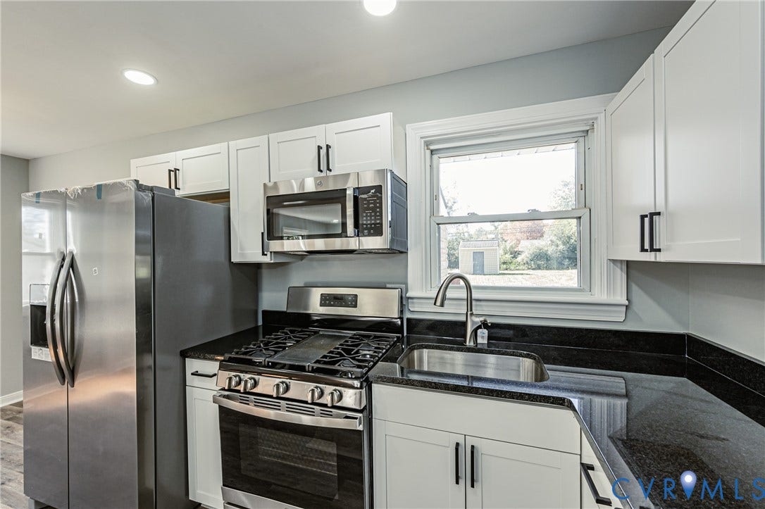506 Meadowspring Road, Henrico, VA 23223 Kitchen featuring white shaker-style cabinetry, dark stone countertops, stainless steel appliances, a gas range, and an undermount sink with a gooseneck faucet