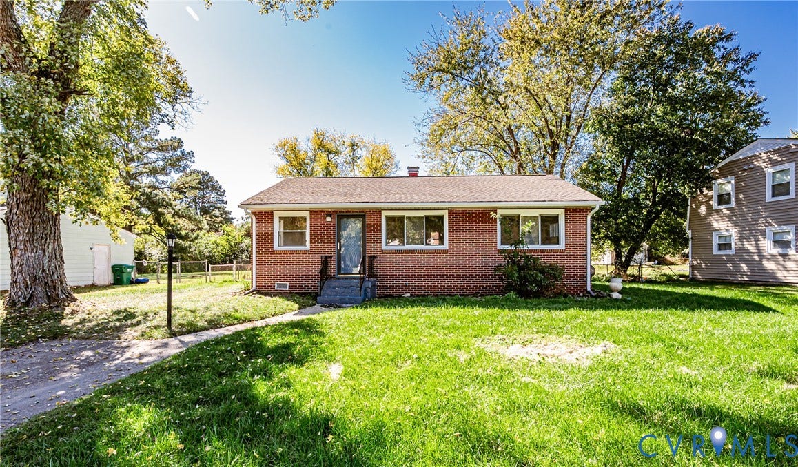 506 Meadowspring Road, Henrico, VA 23223 Single-story brick exterior featuring a shingled roof, concrete front steps, and mature trees on a level lot