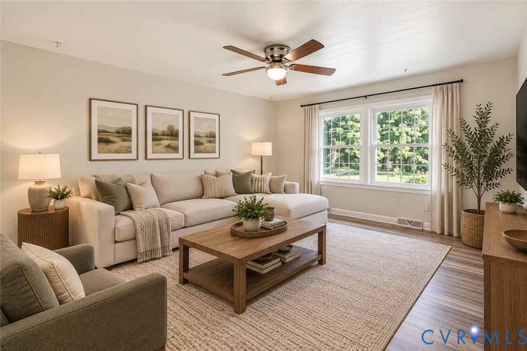 9737 Graves Road, South Chesterfield, VA 23803 Living space featuring wood-finish flooring, dual-pane windows, and a ceiling fan with integrated light fixture, ai staged