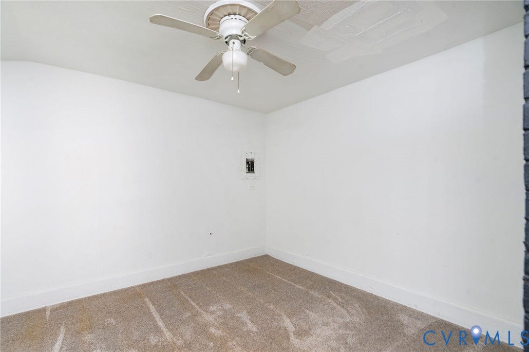 14043 Jefferson Highway, Louisa, VA 23024 Interior room featuring neutral wall paint, wall-to-wall carpeting, and a central ceiling fan with an integrated light fixture