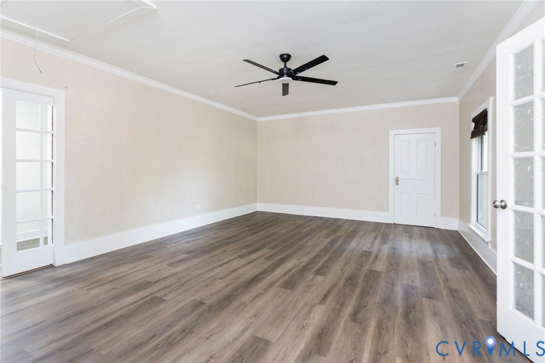 14043 Jefferson Highway, Louisa, VA 23024 Interior room featuring wood-finish flooring, a ceiling fan with integrated lighting, crown molding, and two sets of French doors with glass panes