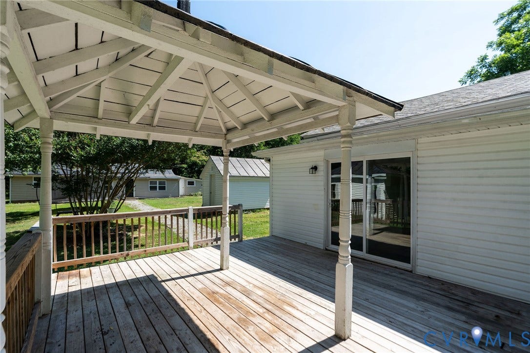 14043 Jefferson Highway, Louisa, VA 23024 Exterior wood decking featuring a covered gazebo structure with decorative pillars and sliding glass entry doors