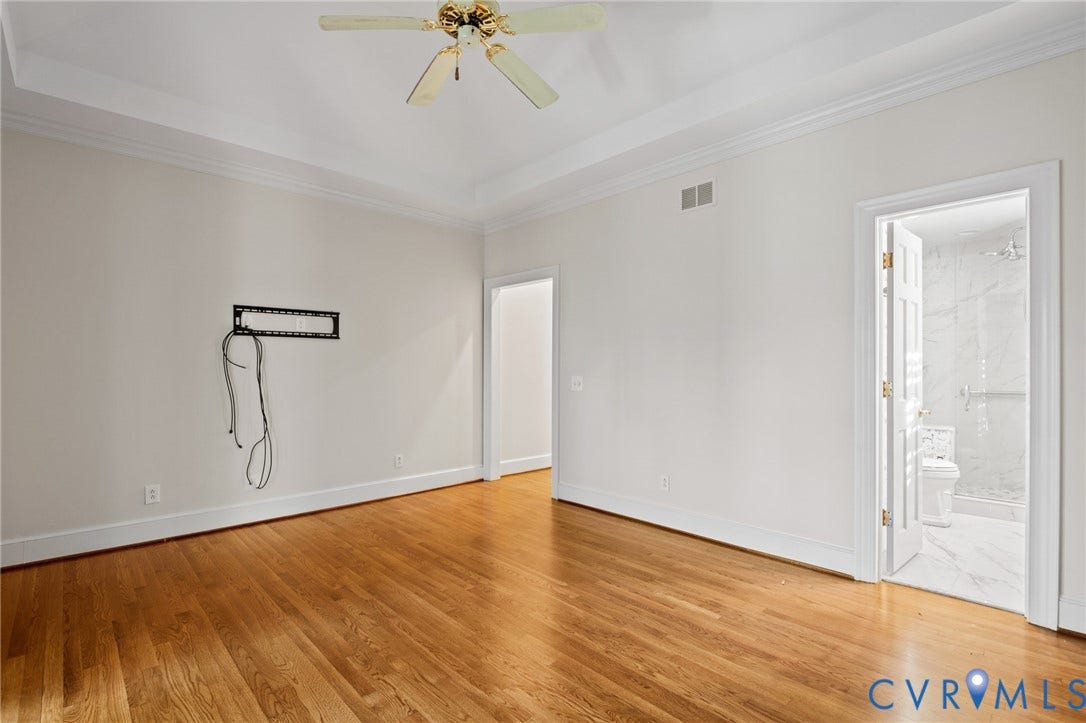 11429 Barrington Bridge Court, Henrico, VA 23233 Room featuring tray ceilings, wood-finish flooring, and a ceiling fan with integrated lighting