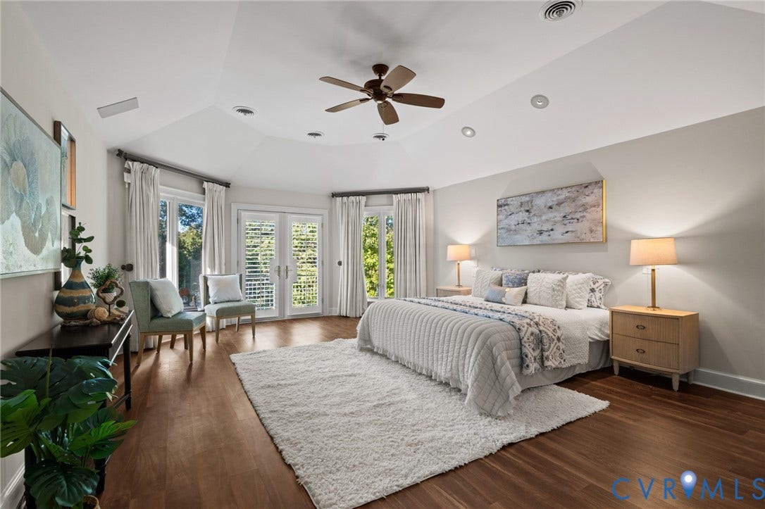 11429 Barrington Bridge Court, Henrico, VA 23233 Vaulted ceiling with recessed lighting and a central ceiling fan, wood-finish flooring, and double glass-paneled exterior doors with plantation shutters