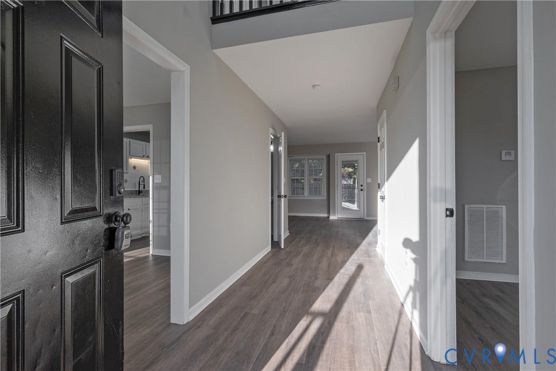 7009 Summers Trace Court, Chesterfield, VA 23832 2 Story Foyer featuring new flooring, neutral interior paint, and a paneled entry door