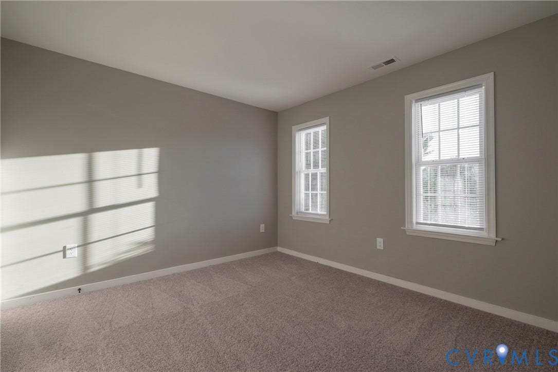 7009 Summers Trace Court, Chesterfield, VA 23832 Bedroom #2 Room featuring neutral-toned walls, carpeting, and two double-hung windows with white trim